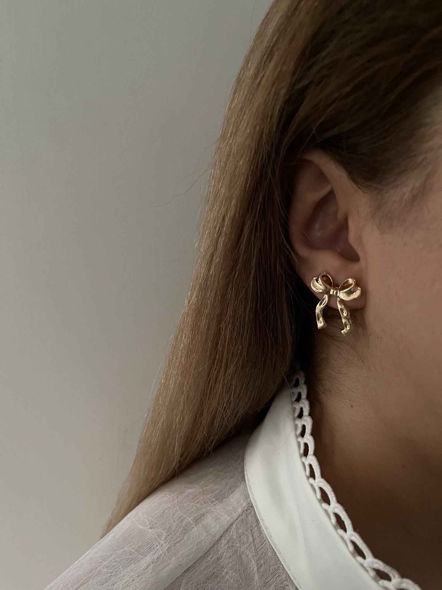 IMG_COM_202512040054202072 گوشواره پاپیون - تصویر 1